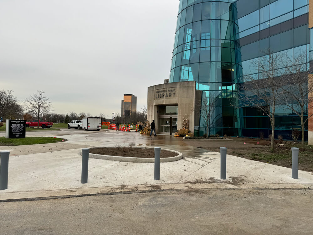 Concrete bollards installed to protect property and control vehicle access