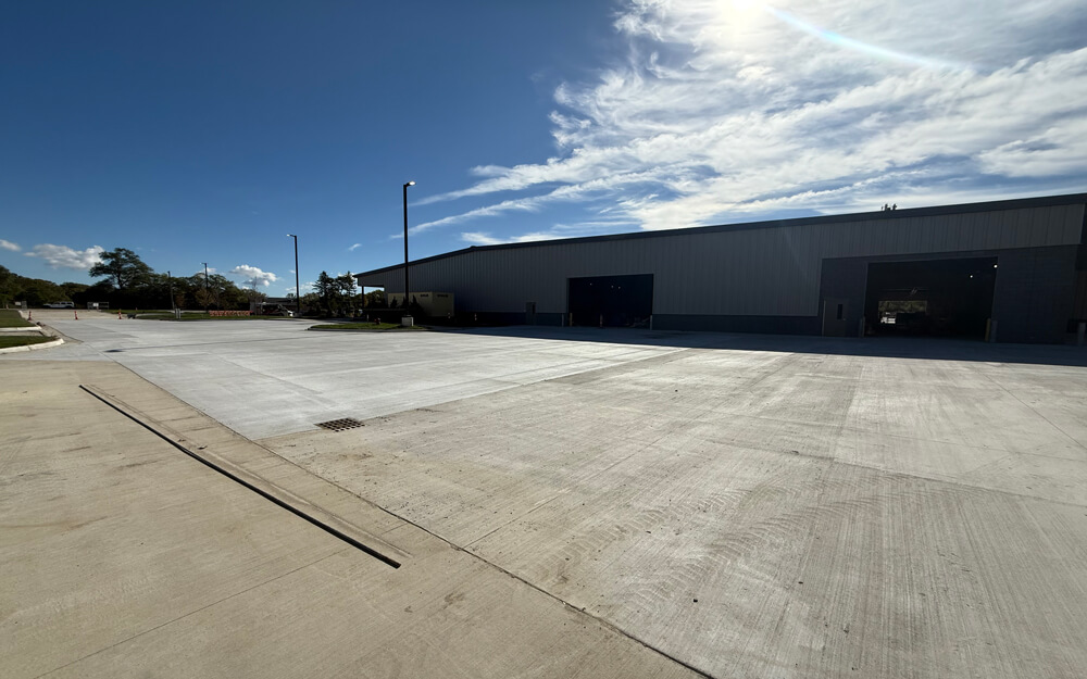 Concrete driveway installation with smooth finish